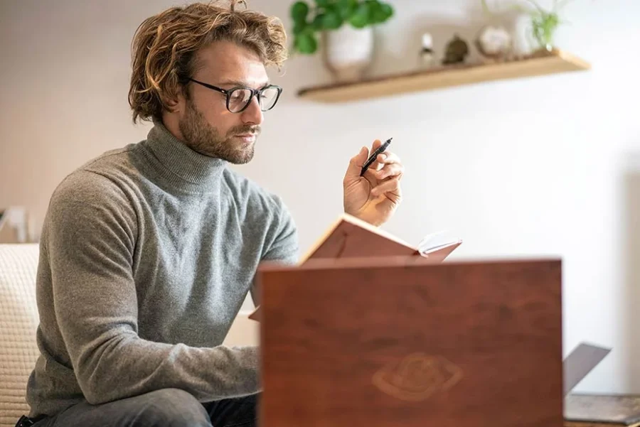 Person reading psychedelic book and optimally preparing